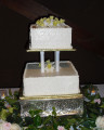 The wedding cake was designed by Robert and was multi-layer carrot cake with daffodils on each layer....of course!